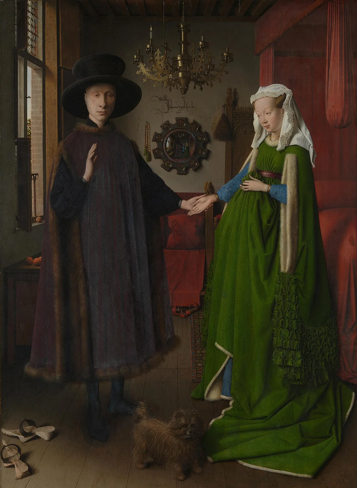El matrimonio Arnolfini de Van Eyck; al fondo, un espejo convexo refleja la habitación en miniatura